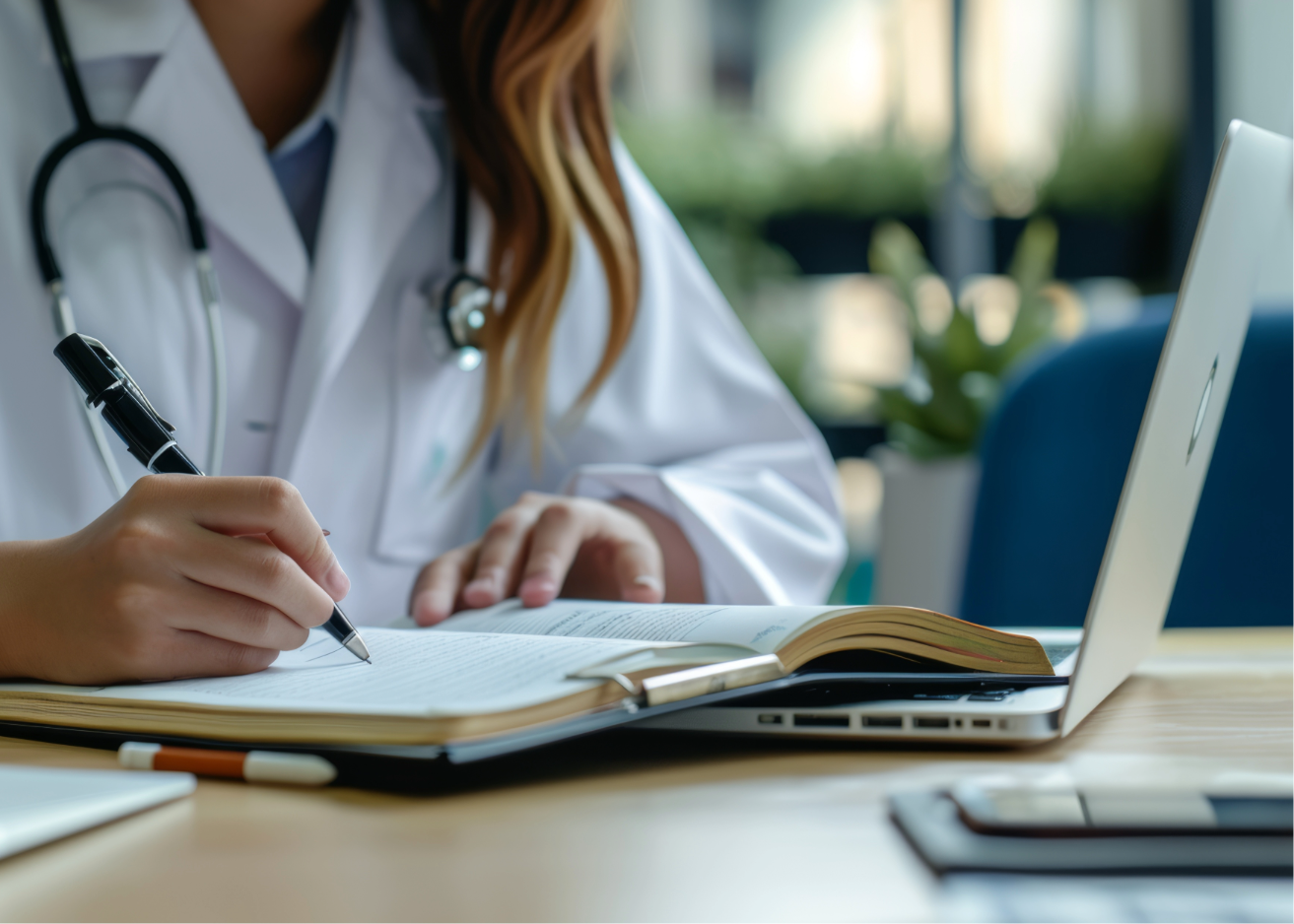 Doctor writing informaiton